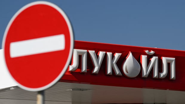 The logo of Russia's energy giant Lukoil is pictured at a petrol station in Sofia on October 23, 2025. After growing frustration over Russia's refusal to agree to a ceasefire, Washington has sanctioned two of its largest oil producers.