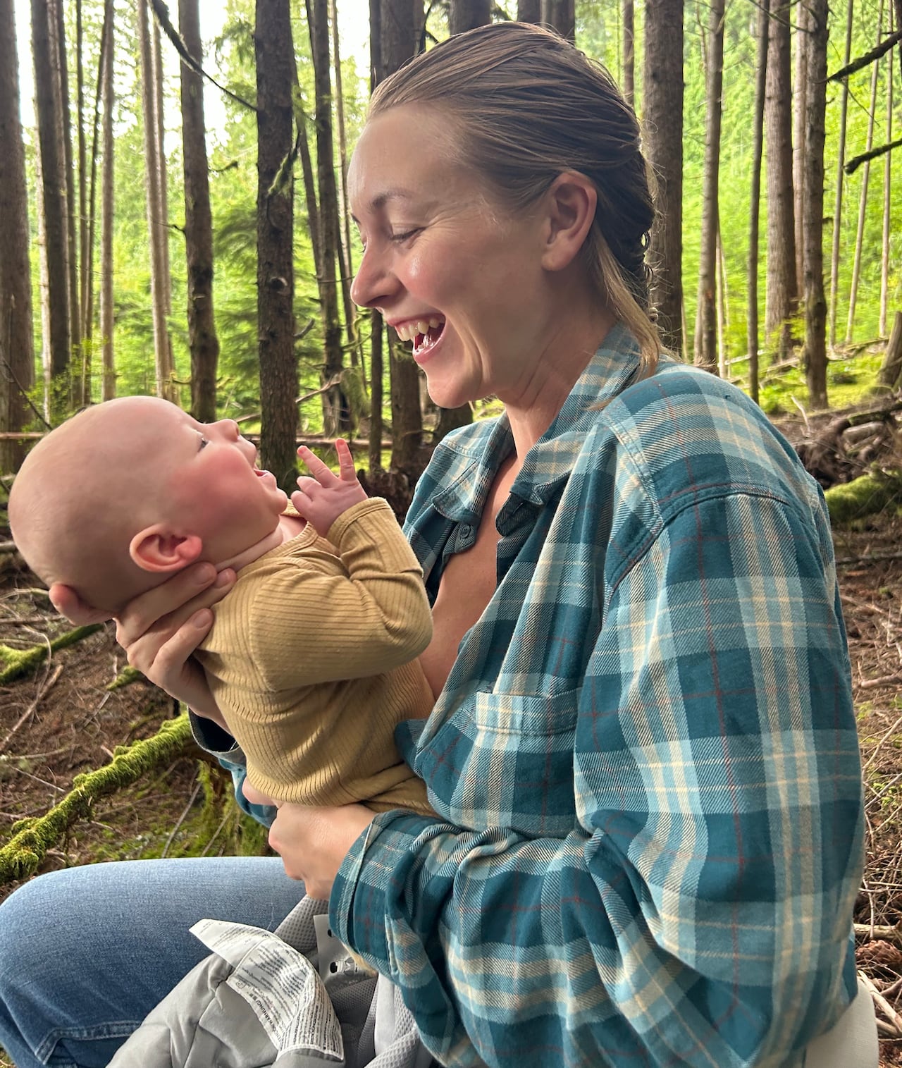 A mother and her baby in the forest 