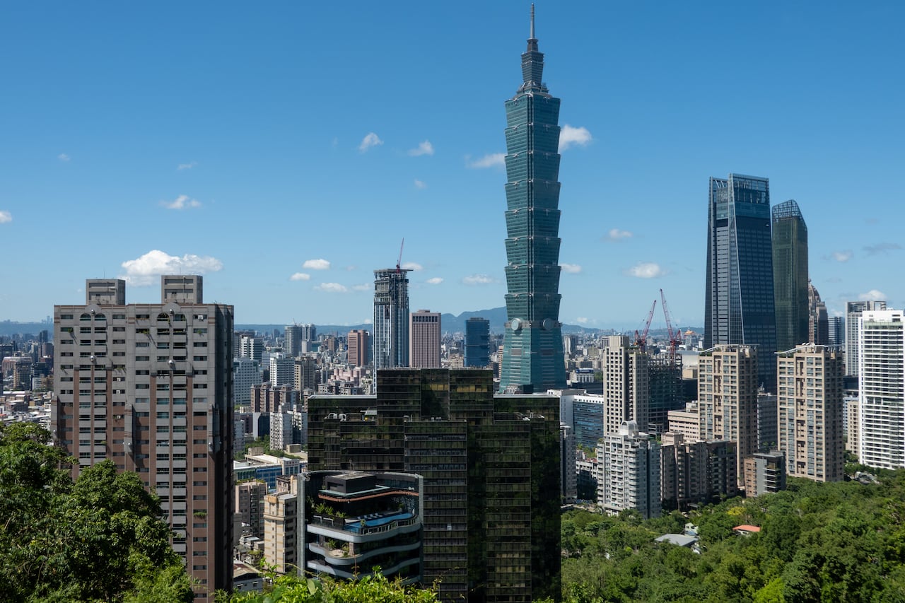 Tall buildings are shown on the city skyline.