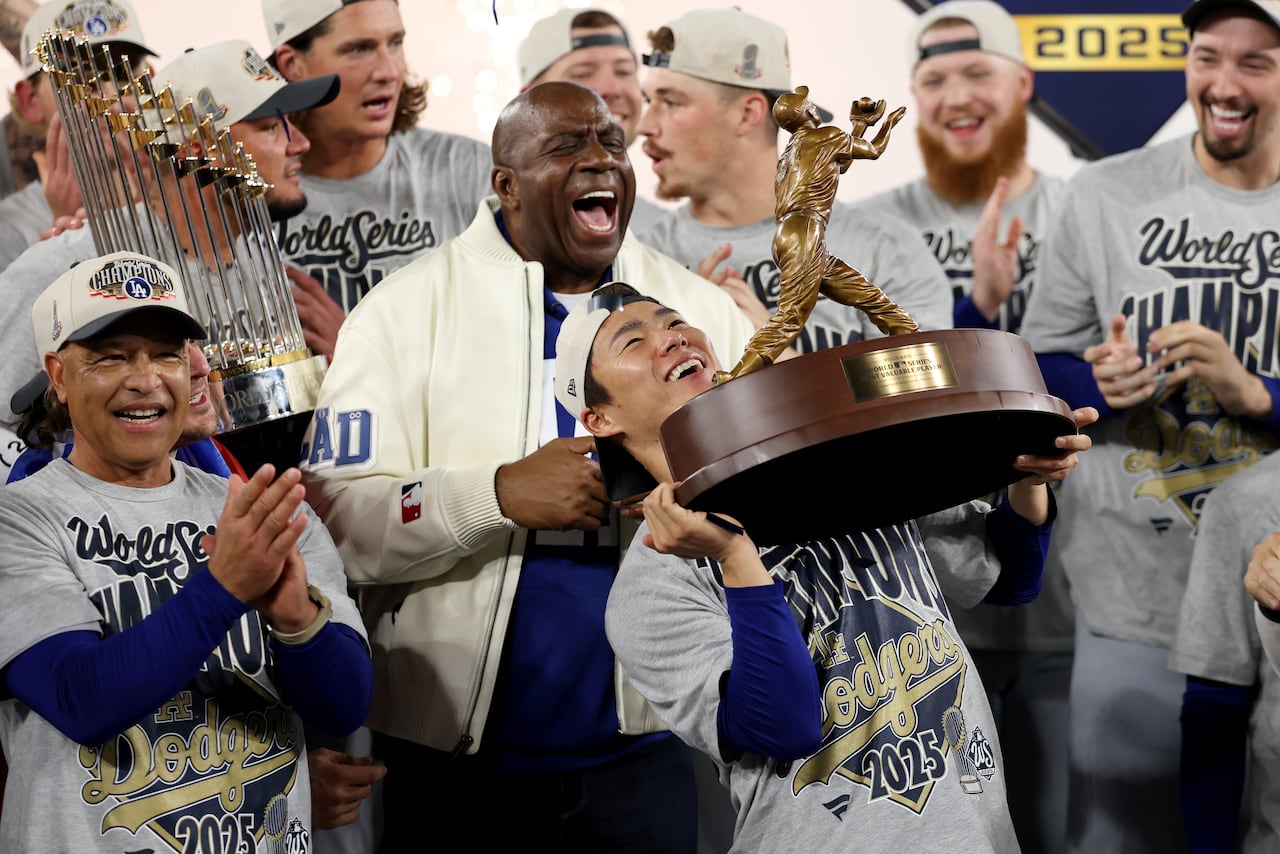 Baseball players celebrating a championship victory on the field after their win