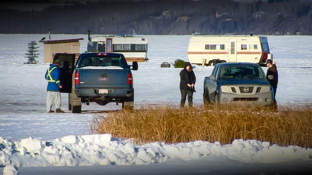 Trucks on the ice of Sylvan Lake Trucks on the ice of Sylvan Lake