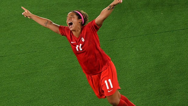 female soccer player cheering