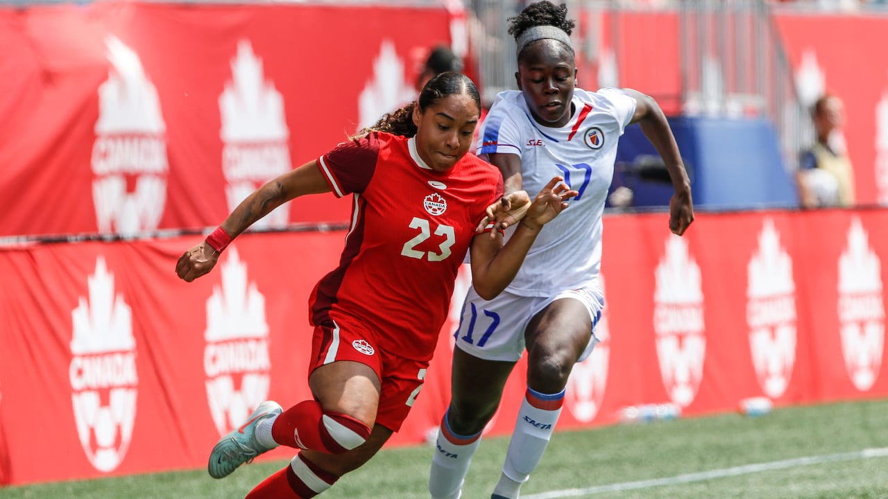 Two female soccer players including one Canadian.