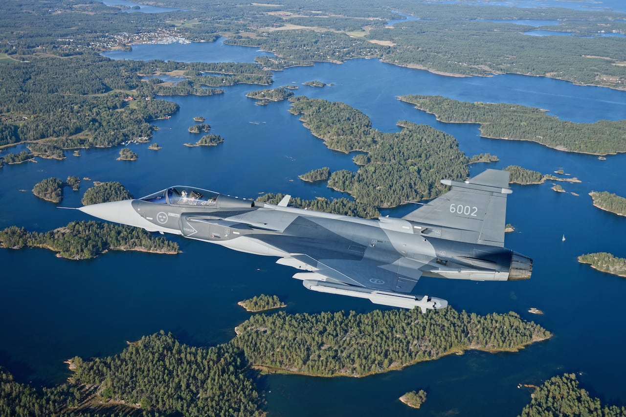 A military aircraft from the Gripen-E series of the Swedish company SAAB. 
