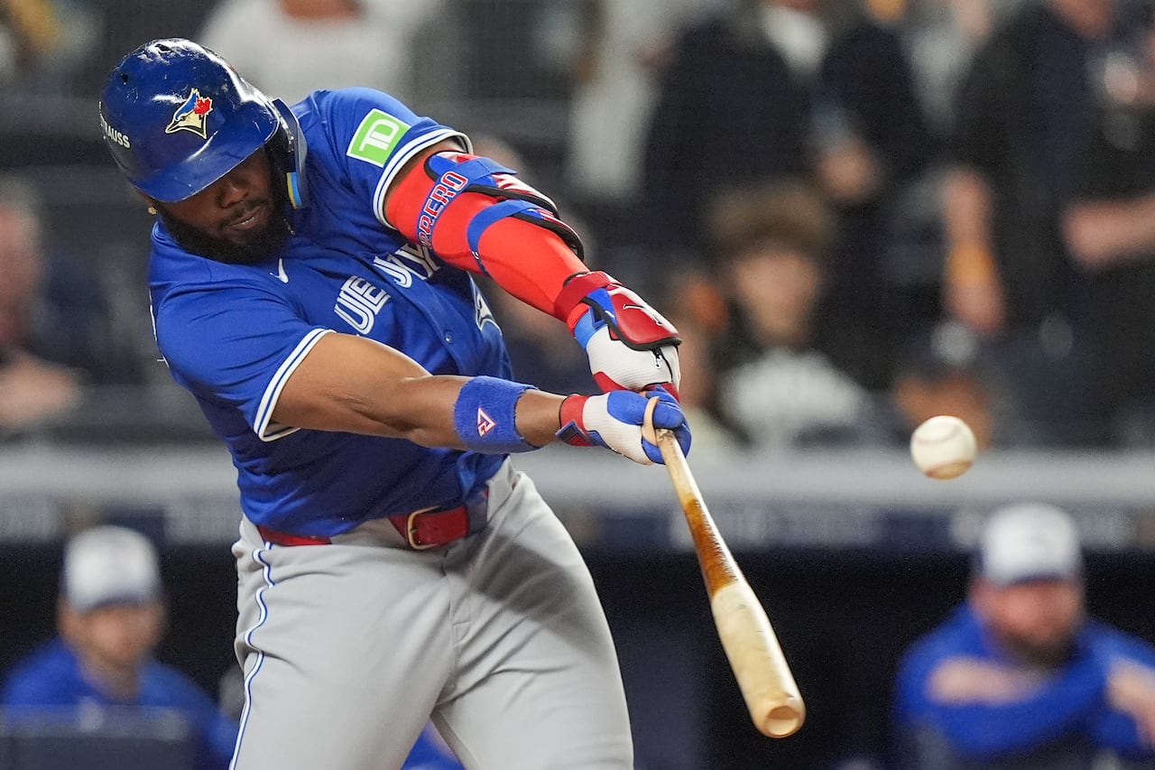 A baseball player swinging a bat