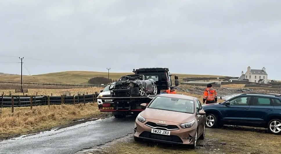 Arenn Pearson's Pearsche is loaded onto the trailer after being drawn north of the ocean not far from Claire Leque located dead the stab wounds.