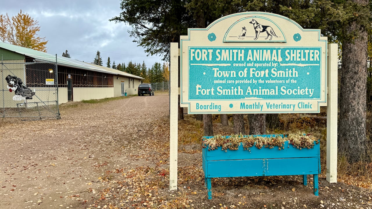 Animal shelter sign in front of the shelter building.