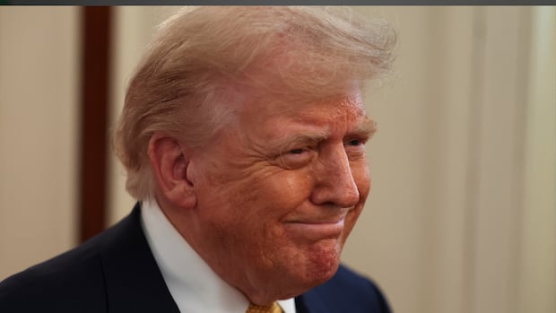 U.S President Donald Trump reacts on the day he signs the HALT Fentanyl Act, in the East Room at the White House in Washington, D.C., U.S., July 16, 2025. Donald Trump scowling