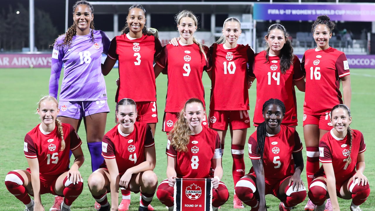 A women's shot squad poses for a radical photograph connected the field.