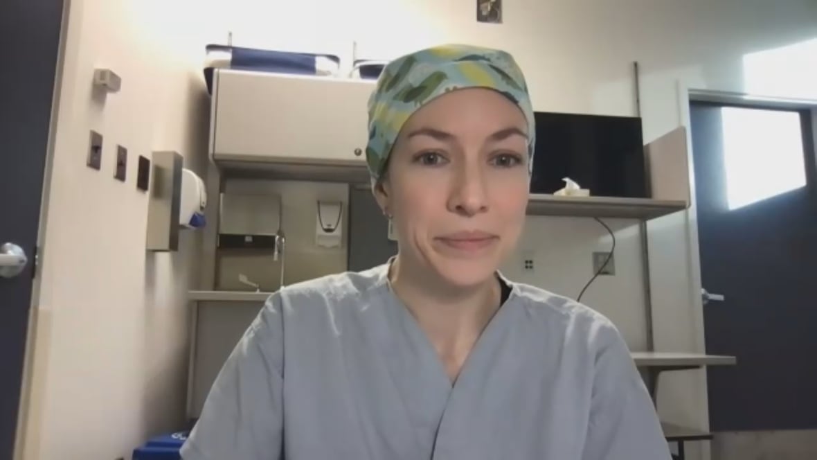 A doctor is shown in a clinical room on a video call.