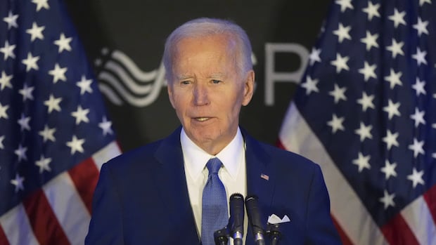 FILE - Former President Joe Biden speaks at a conference in Chicago, April 15, 2025. (AP Photo/Nam Y. Huh, File) US President Joe Biden, an elderly man in a suit, stands at a podium, American flags behind him.