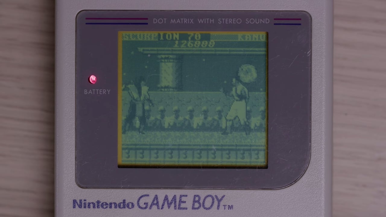 video game screenshot of a fighting game on the grey-green Game Boy screen.