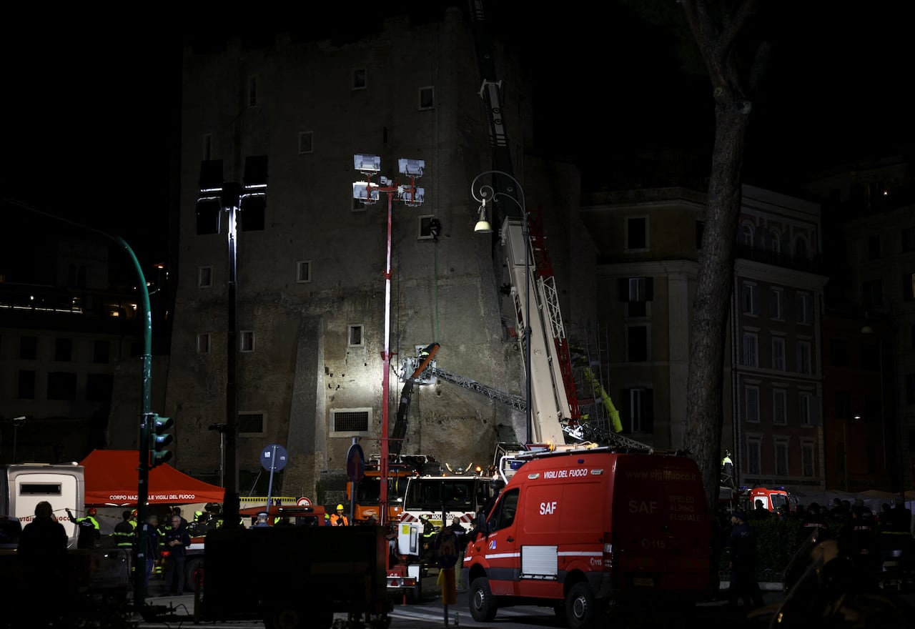 Emergency crews at the scene of a partial building collapse.