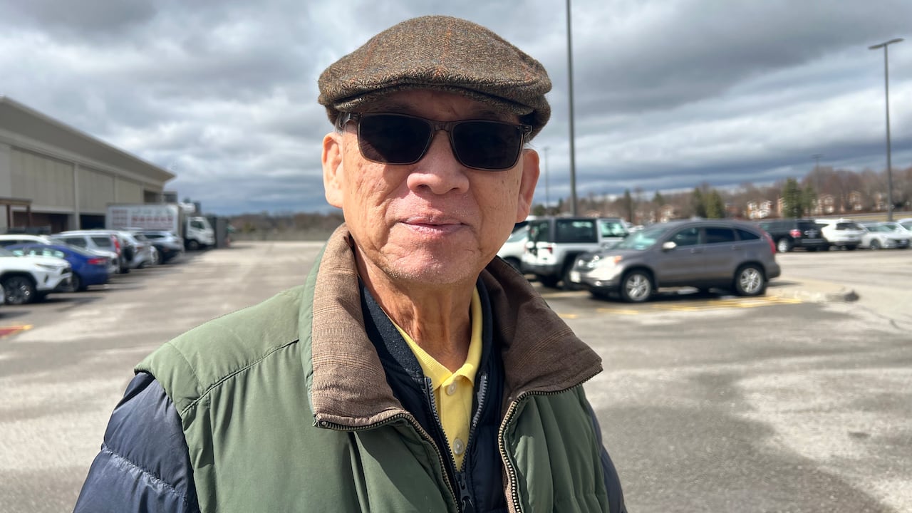 An older antheral   wearing a chapeau  and sunglasses.