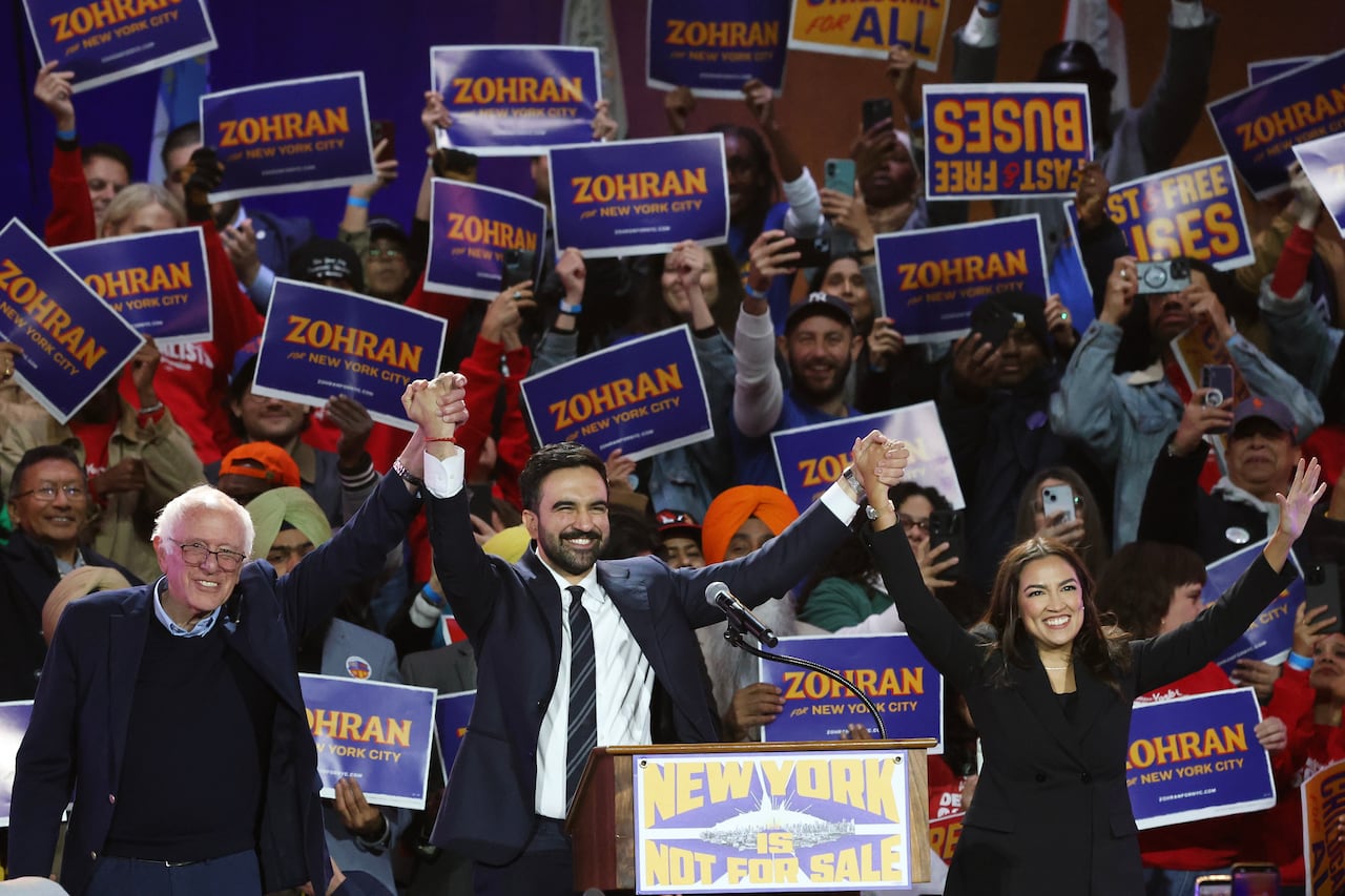 Sen. Bernie Sanders, left, to be done by York City Cinerd TotanDani, center Alexandria Ocasio-Cortez appeared on stage during the rally, Sunday, Oct. 26, 2025, New York. 