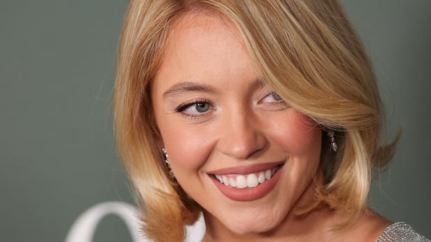 A closeup of a smiling woman