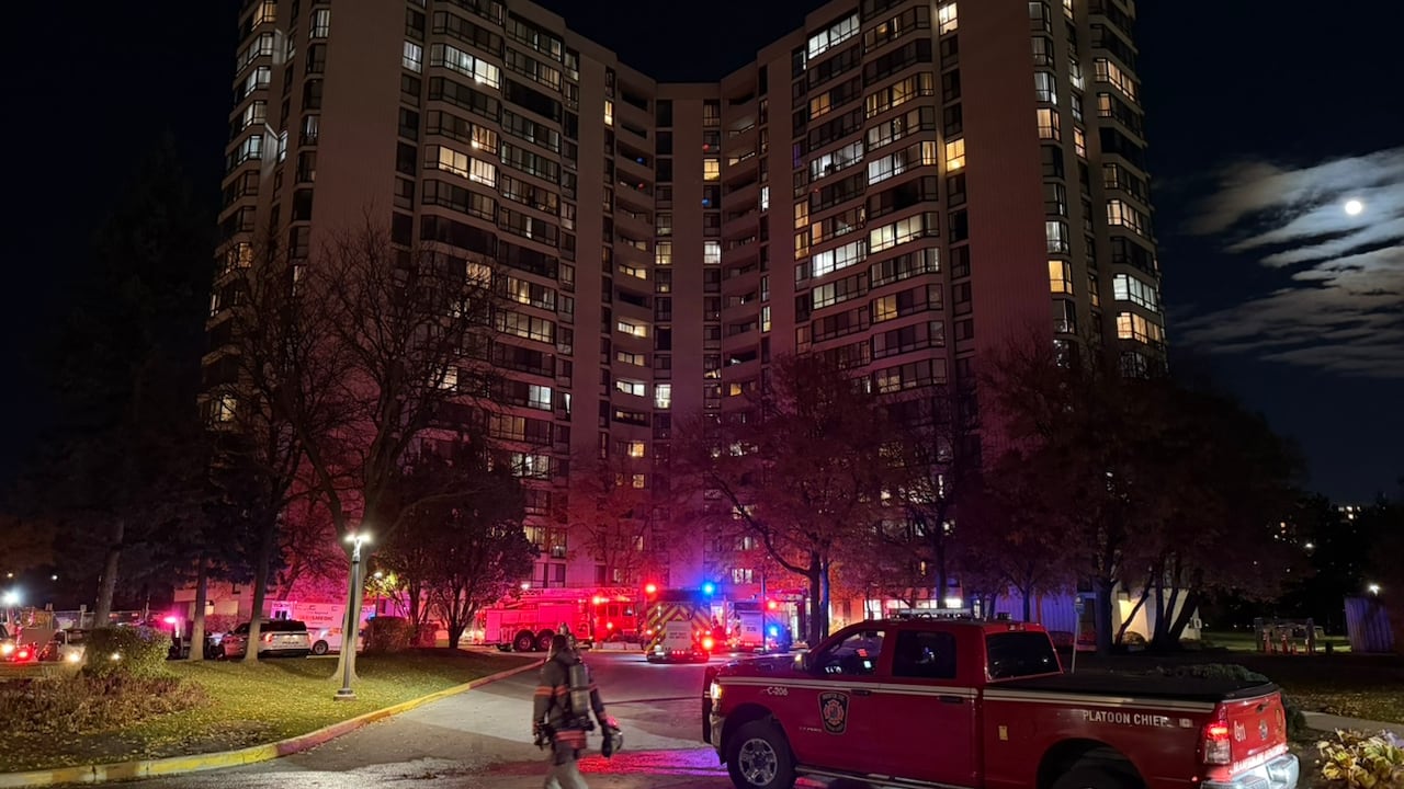 A occurrence  services pick-up motortruck  extracurricular  of an flat  building. Firetrucks with their lights connected  tin  beryllium  seen successful  the inheritance  person  to the building's entrance.