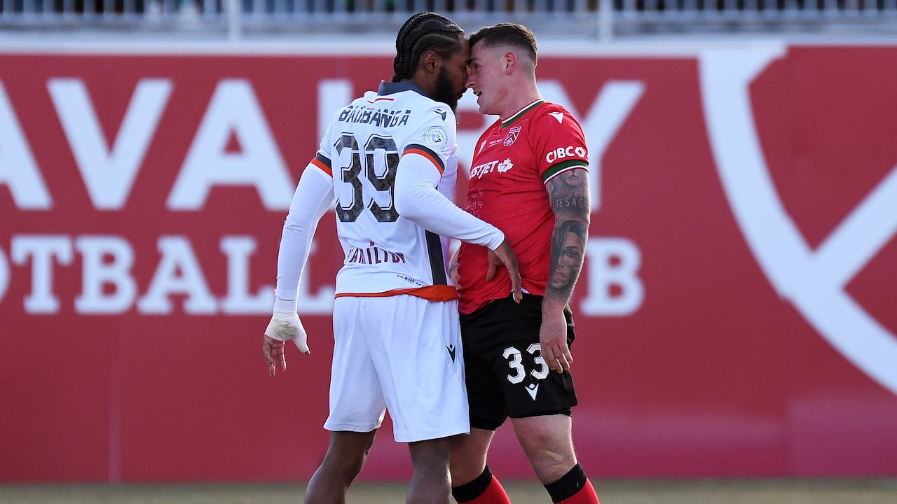 Two soccer/football players.