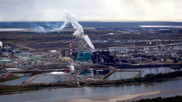 A Suncor oilsands mine facility seen from the air near Fort McMurray, Alta., Monday, Sept. 19, 2011.THE CANADIAN PRESS/Jeff McIntosh A Suncor oilsands mine facility seen from the air near Fort McMurray, Alta., Monday, Sept. 19, 2011.